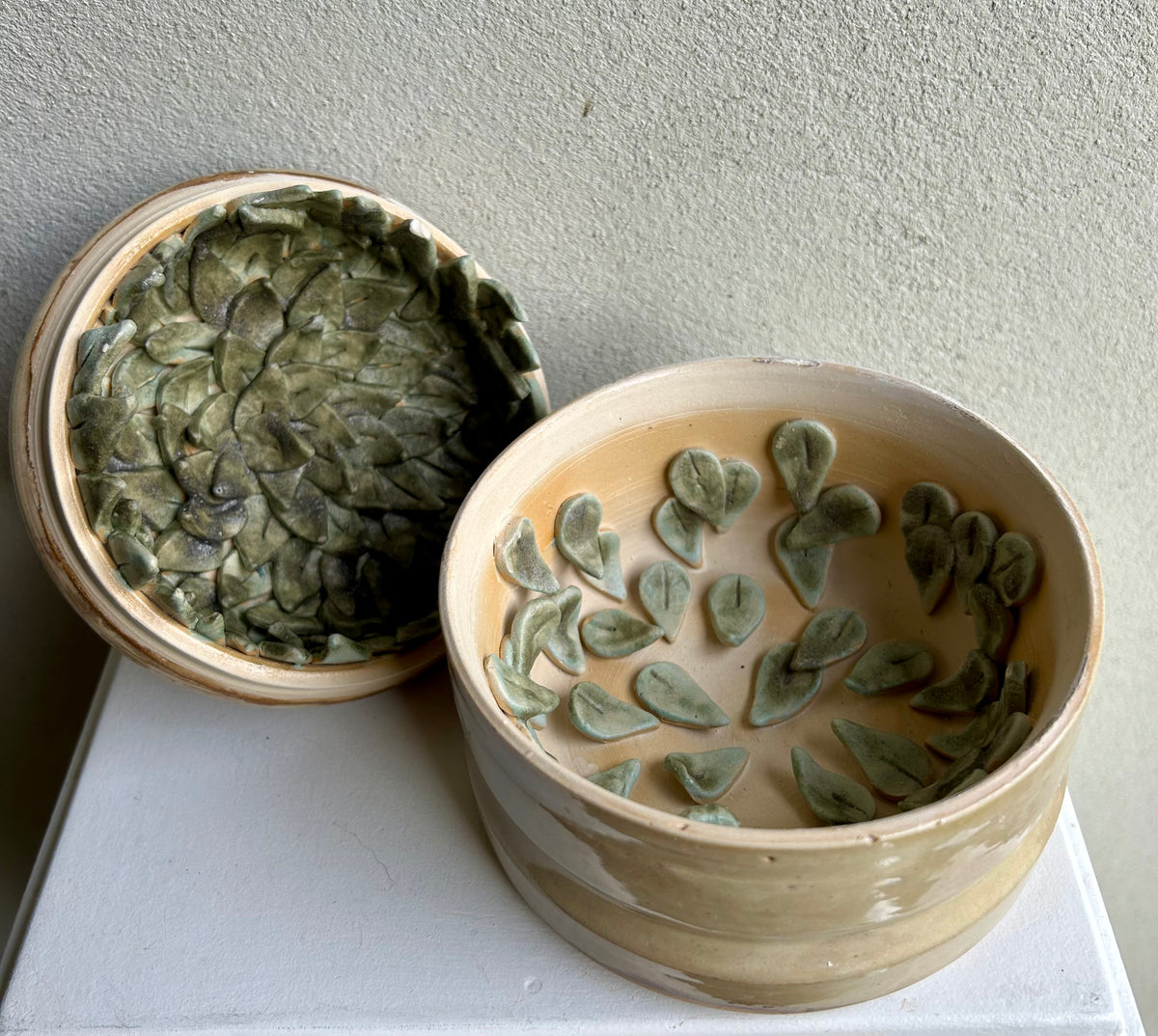 Lidded box with upside down tree